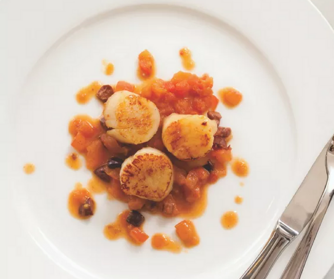 Pan-seared sea scallops with tomato and olive