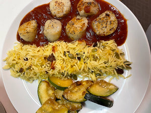 seared scallops with a saffron tomato sauce